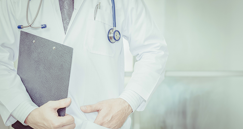 image of a Doctor holding a clipboard signifying Free Visual Health Check